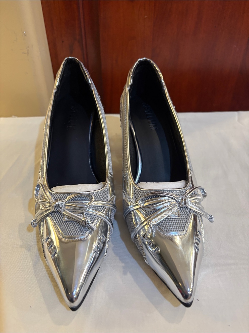 Metallic Silver Pointed-Toe Ballet Flats with Decorative Bow